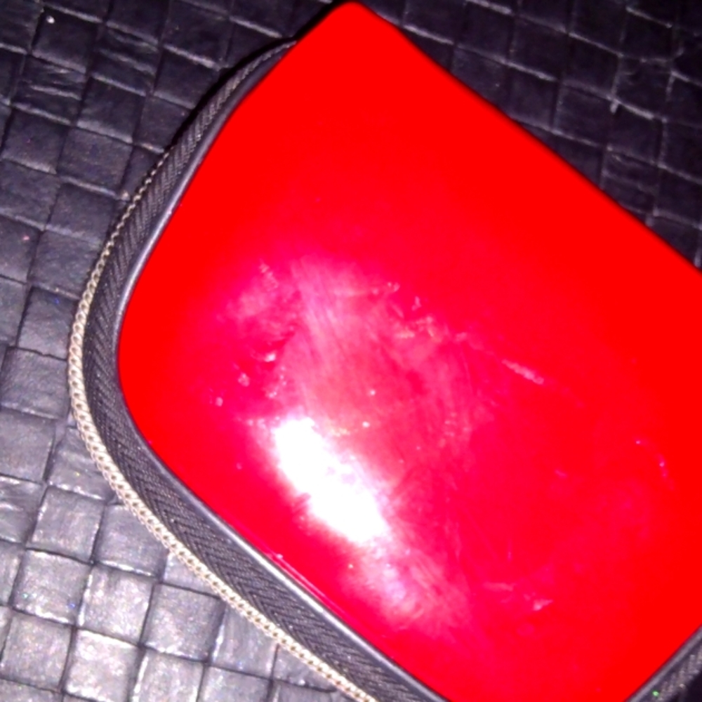 Small red patten leather zip up coin purse